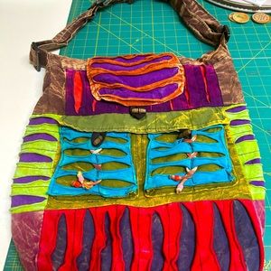 Rising International Handbag